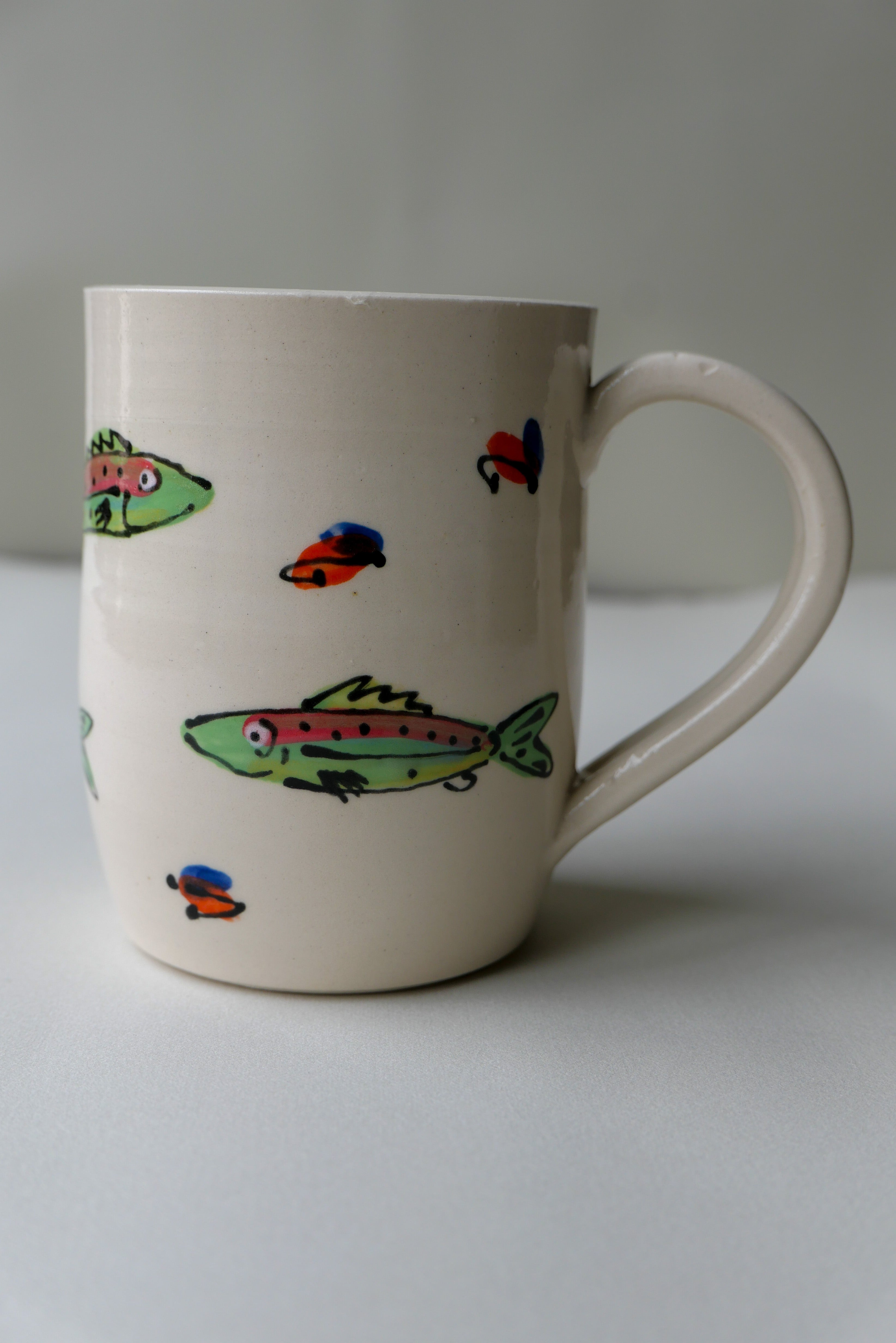 trout and trout fly mug