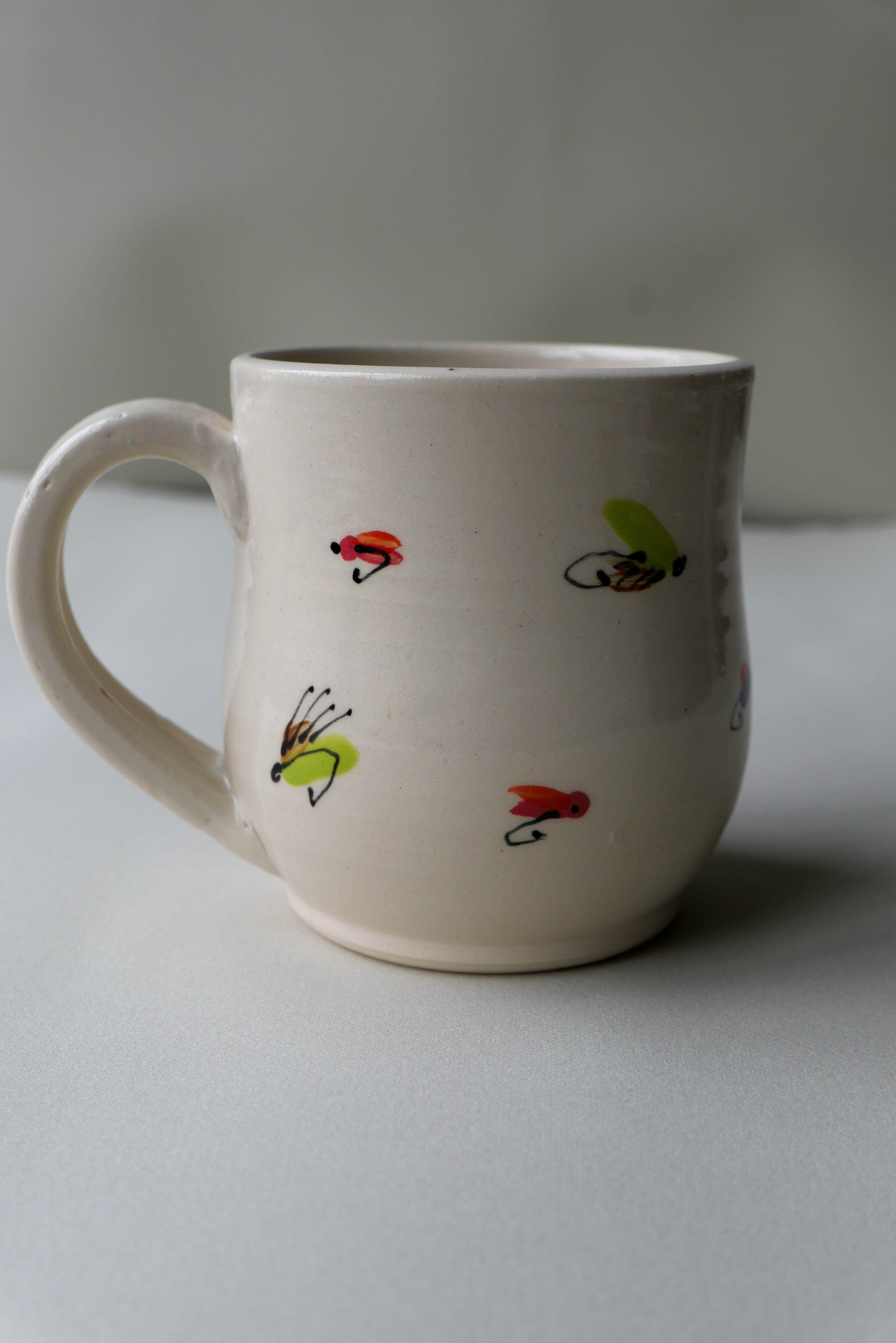 trout fly small mug