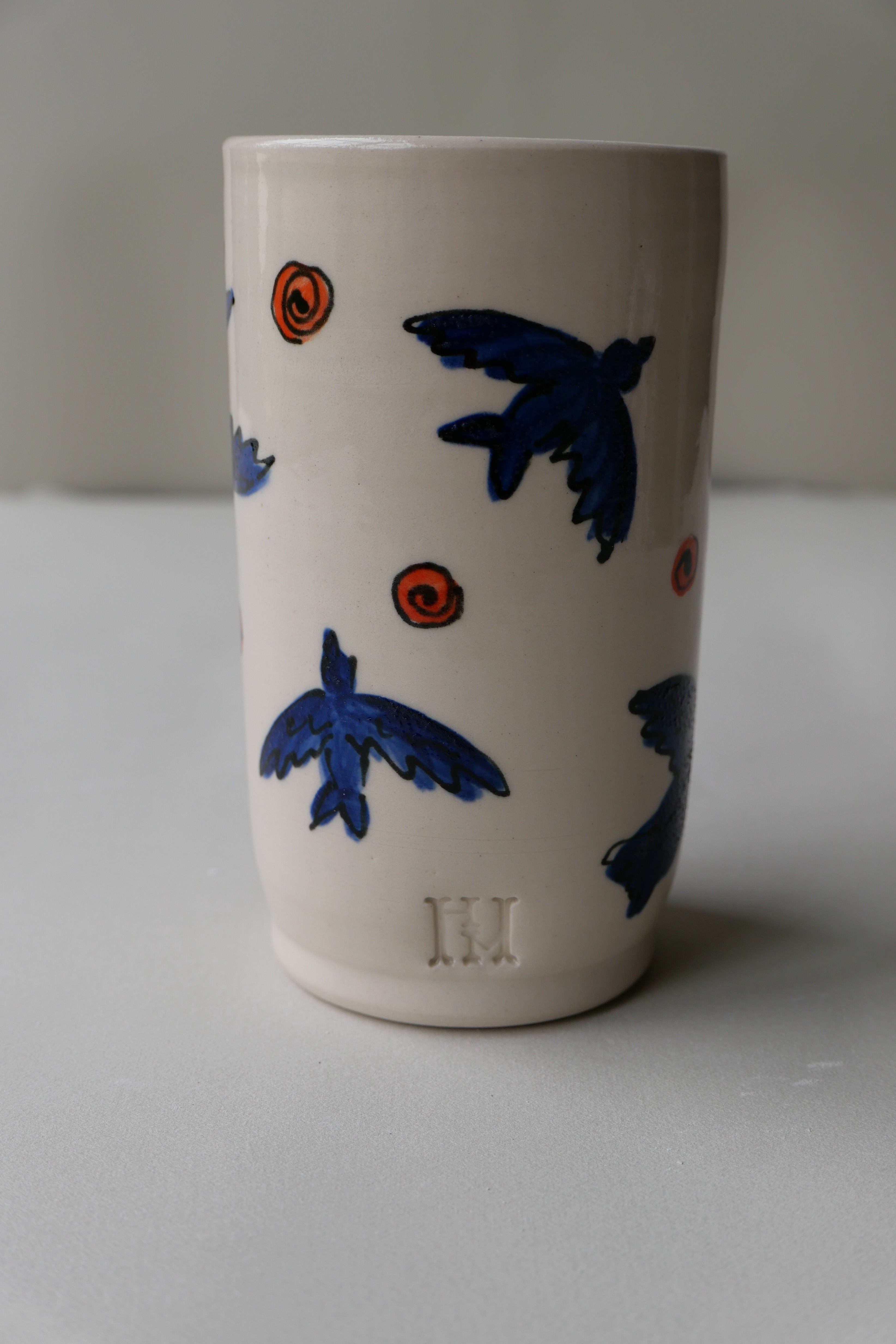 blue and orange bird tumbler no. 1