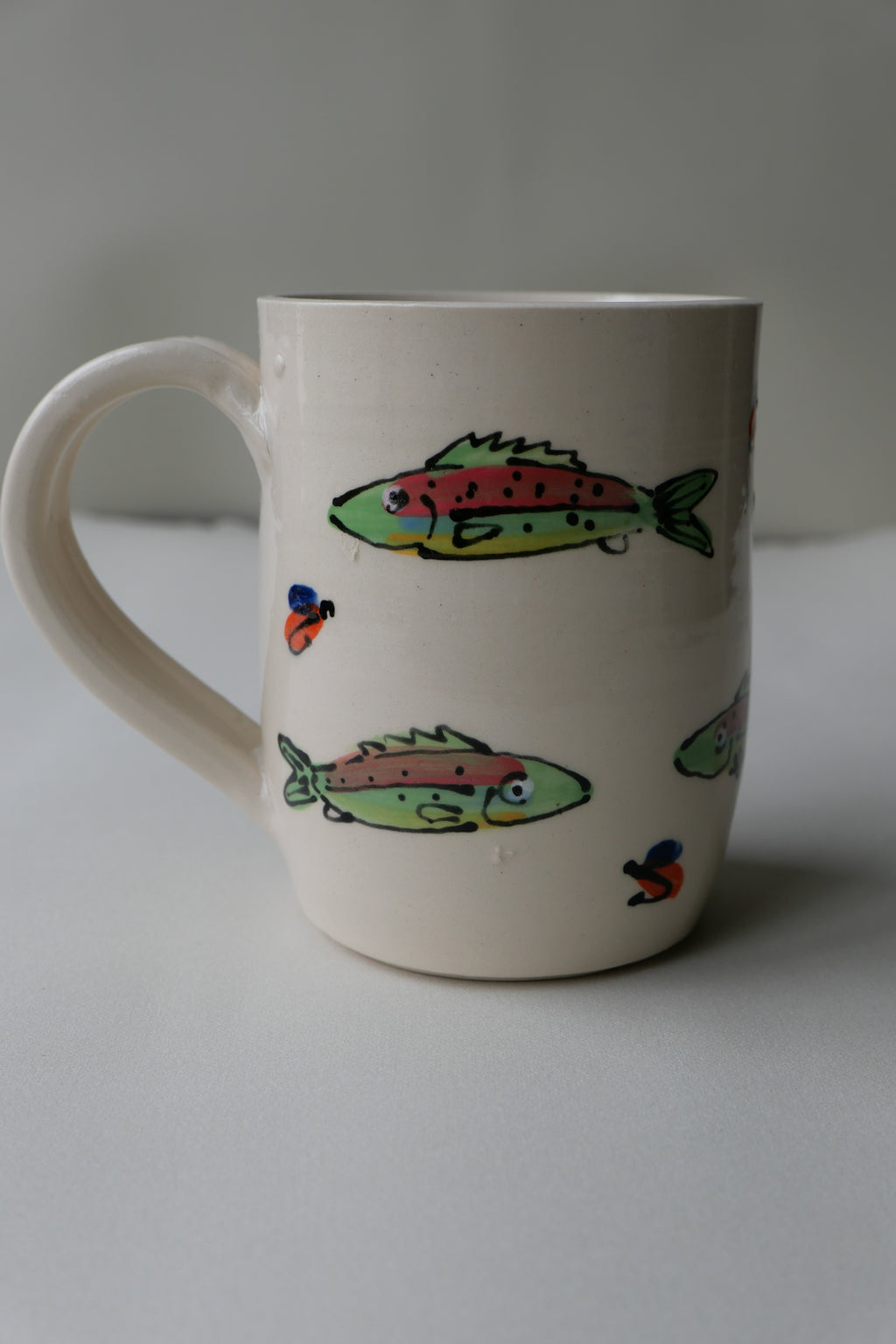 trout and trout fly mug