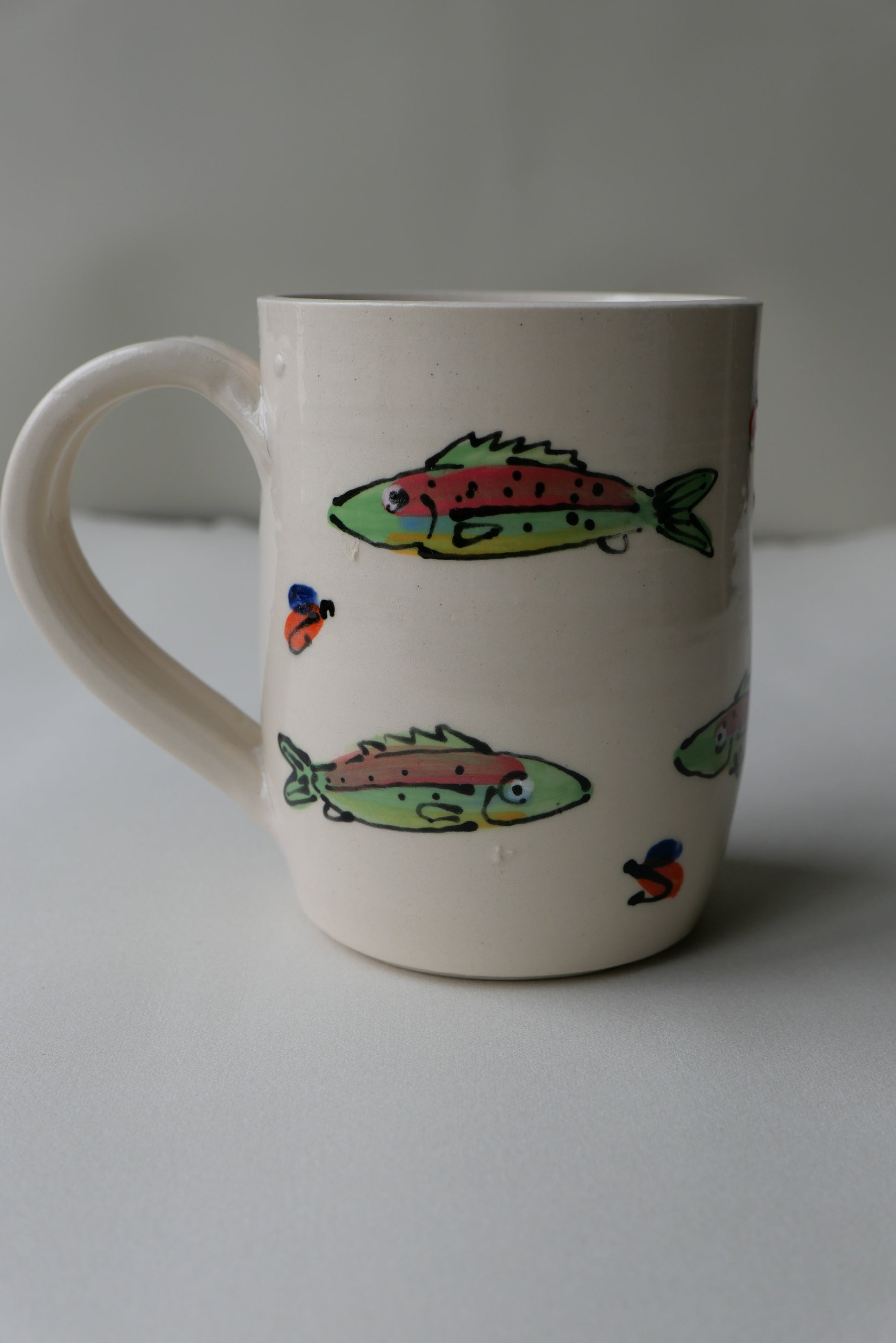 trout and trout fly mug