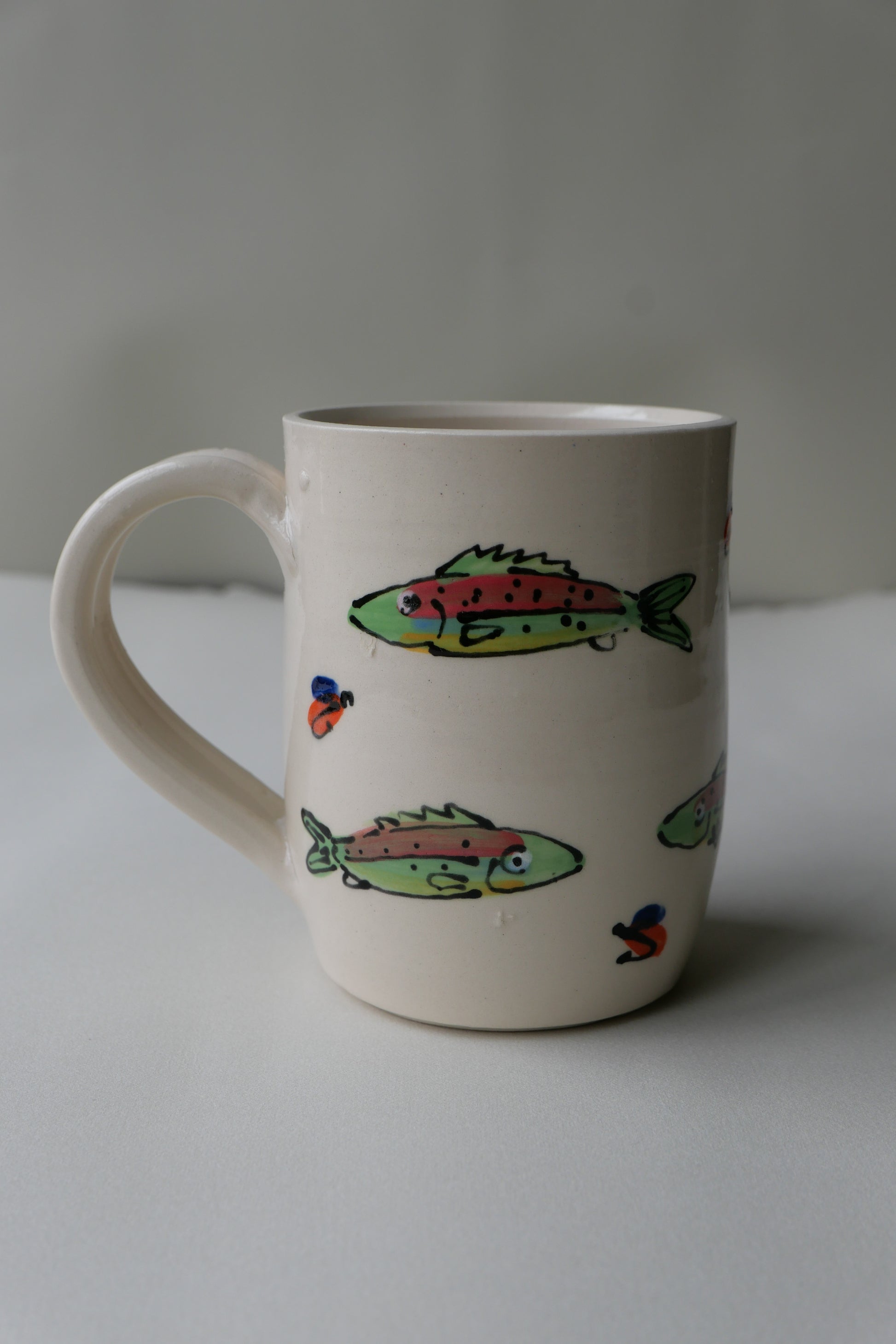 trout and trout fly mug