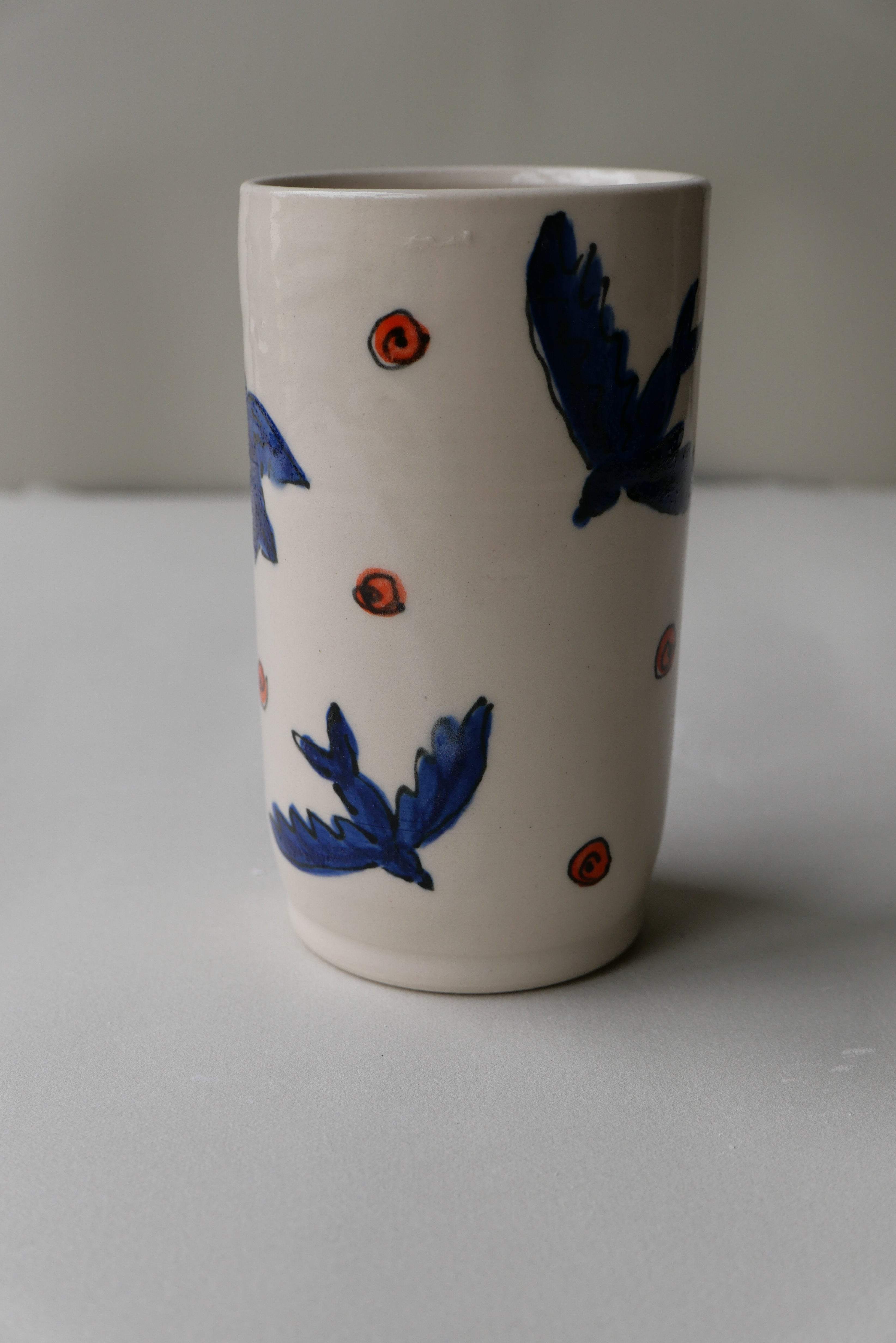 blue and orange bird tumbler no. 1
