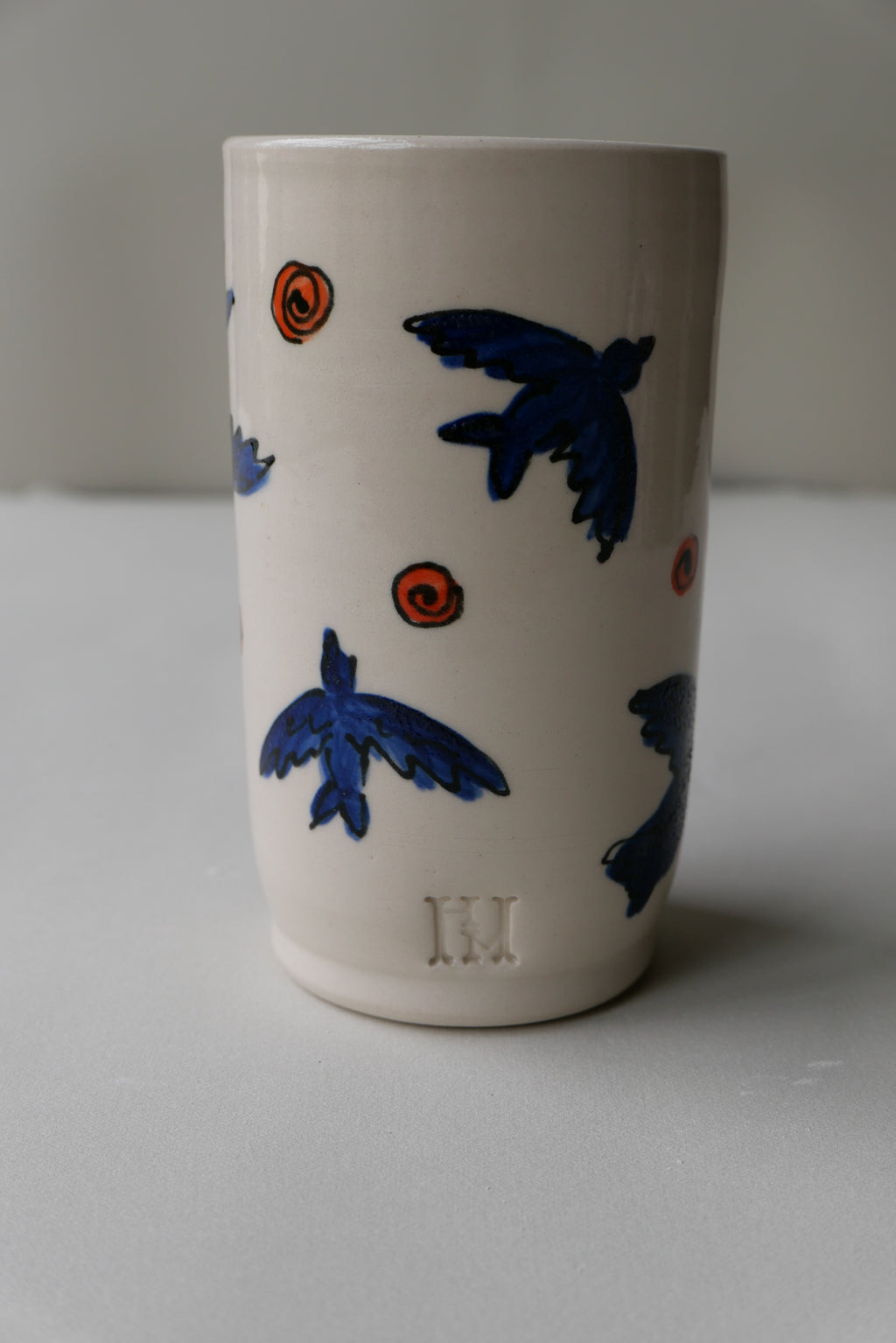 blue and orange bird tumbler no. 1