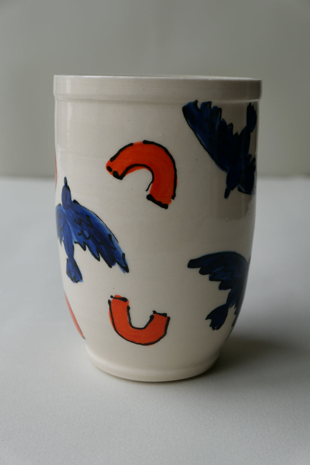 blue and orange bird tumbler no. 2