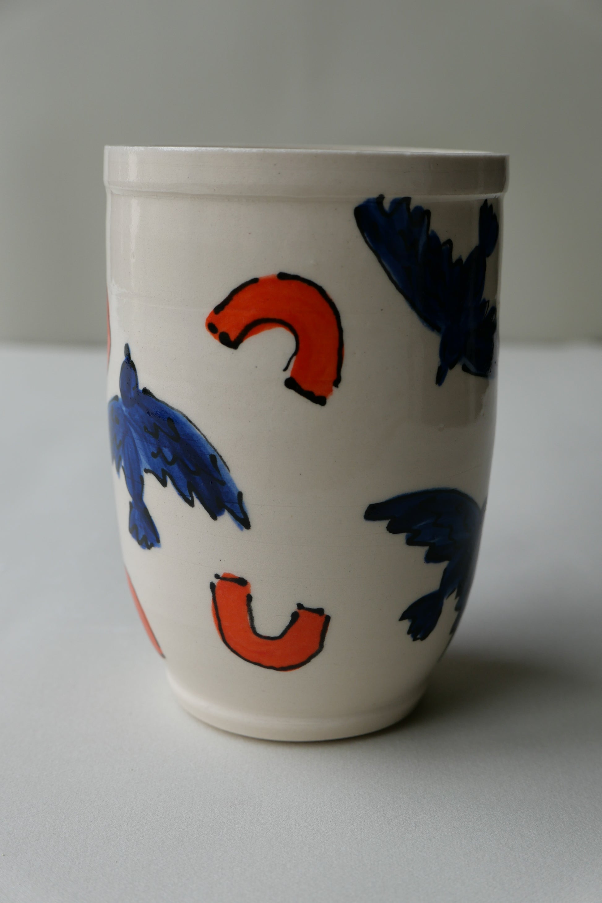 blue and orange bird tumbler no. 2